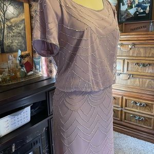 Beautiful long elegant  dress. Can be used for any occasion. Lined short sleeve